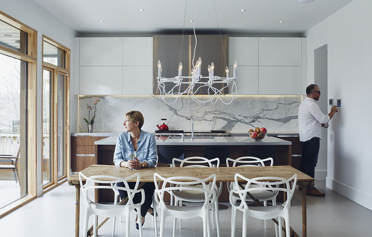 iron_giant-toronto-family-home-smart-tech-kitchen-control4-automation-marble-backsplash-ciot-kantelber-co-wood-table-caesarstone-quartz-countertop-kartell-masters-chairs-eurofase-chandelier