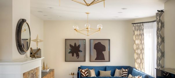 Nod to Nautical Living Room - Pulp Design Studios - Teal and blue velvet sofa, modern edgy living room interior design, brass and glass light fixture, nautical inspired home, modern living room, family room design, chic home inspiration, unique arm chair, round coffee table, geometric rug